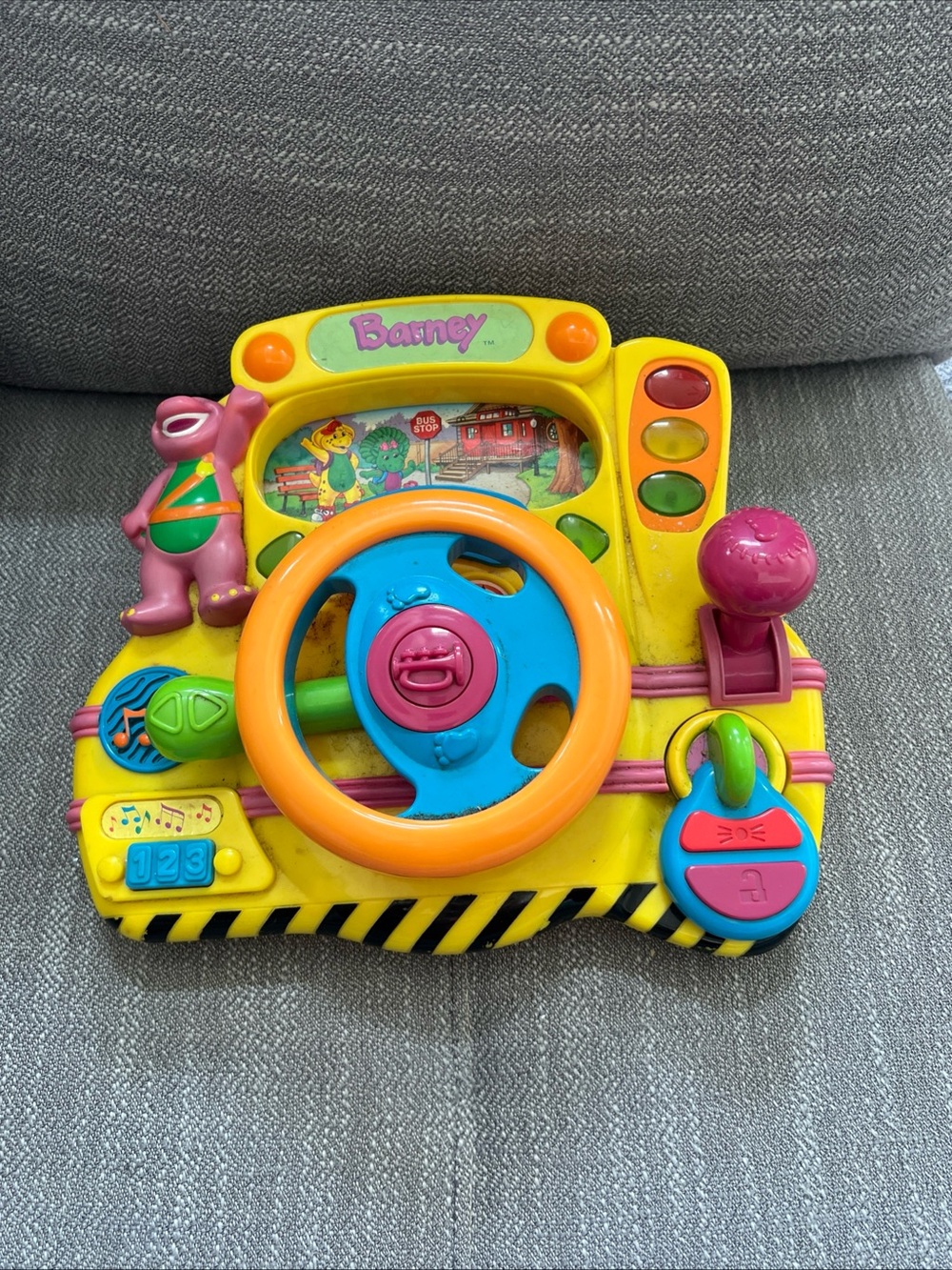 Barneys New York Interactive Steering Wheel Toy - Yellow/Pink/Blue untested
